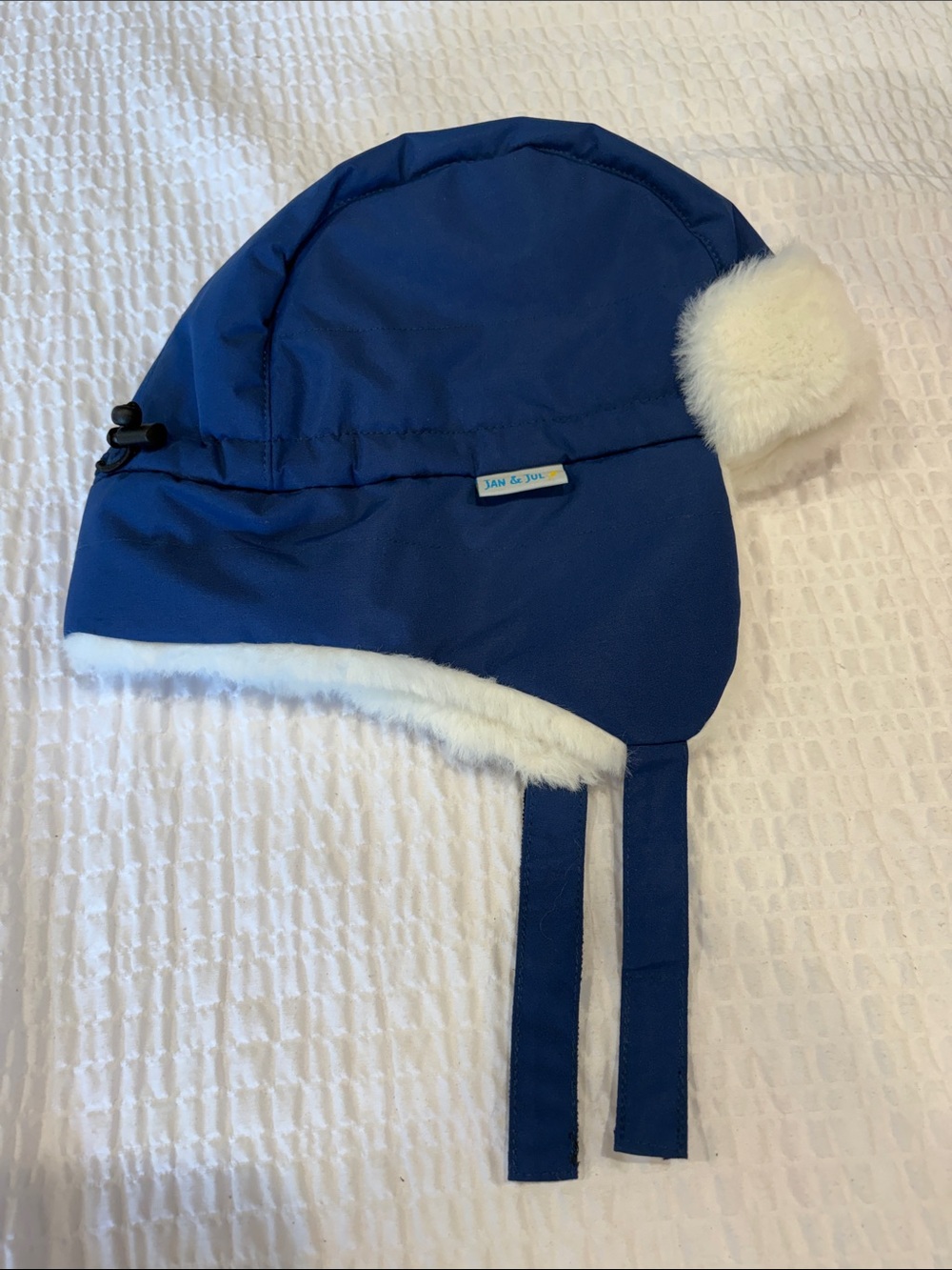Jan & Jul Kids’ Navy Faux-Fur Lined Trapper Hat
Size L (2-5 yrs). NWOT
